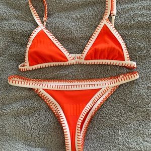 ELLEJAY orange bikini set with white side-stitch detailing.